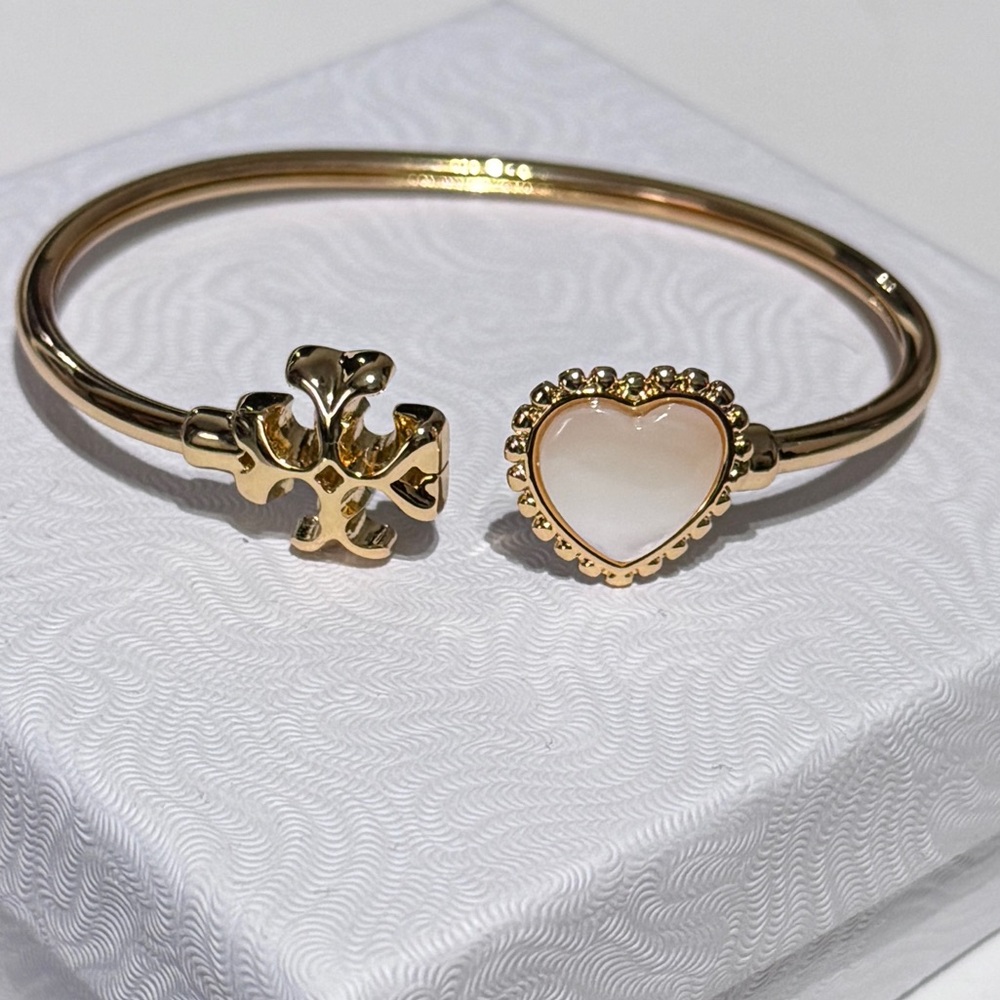 ✨HOST PICK✨ Tory Burch Gold-Tone Logo Cuff — Elegance with a Romantic Twist ✨